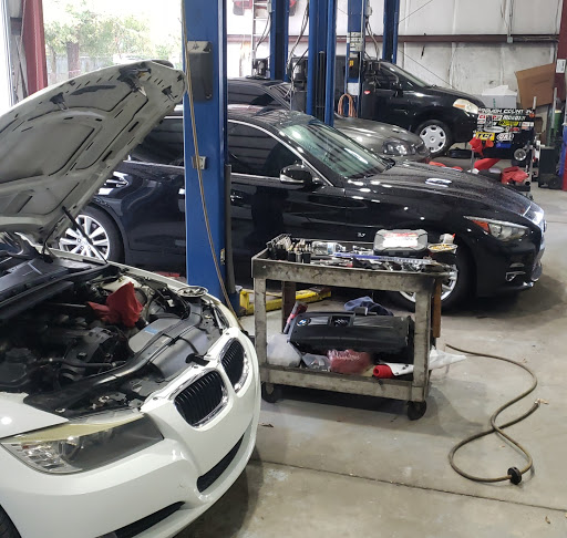 Auto Repair Shop «Mad Hatter Auto Repairs and Mufflers», reviews and photos, 4916 W Linebaugh Ave #101, Tampa, FL 33624, USA