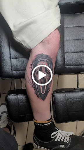 Explore long skinny tattoo ideas, creative tattoo ideas in Ocoee, available at Slaughterized Ink Tattoo and Piercing Studio