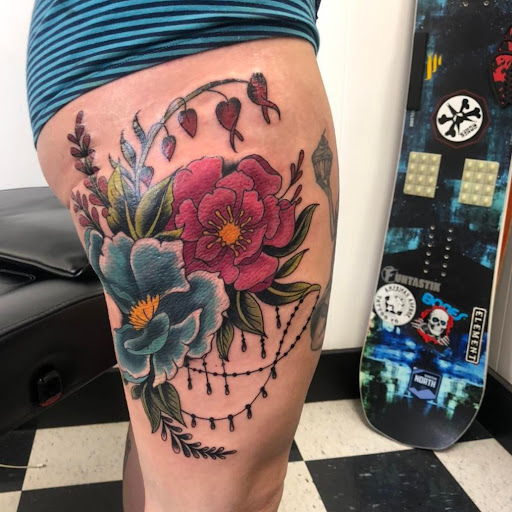 Explore paw print tattoo ideas, creative tattoo ideas in New Cumberland, available at American Anchor Tattoo Co.