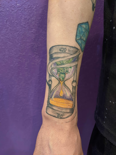 Explore men's inner bicep tattoo ideas, creative tattoo ideas in Denver, available at Nocturnal Tattoo