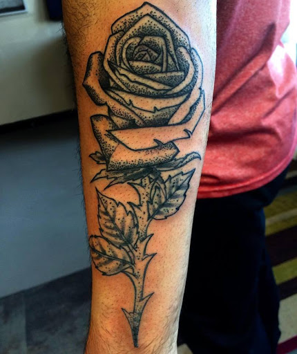 Find lettering tattoo ideas for your next unique tattoo in Houston at Rose & Dagger Tattoo