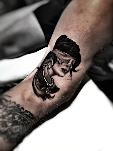 Explore great shoulder tattoo ideas, creative tattoo ideas in Lavonia, available at 1890 Tattoo Co.