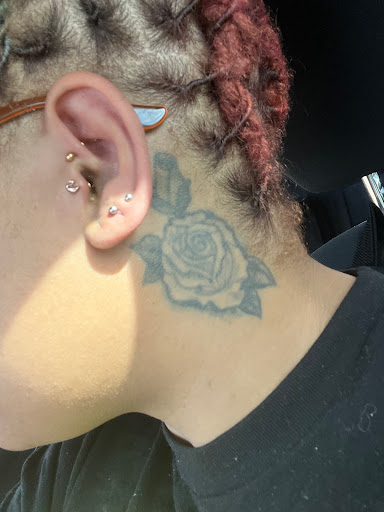 Explore f1 tattoo ideas, creative tattoo ideas in Columbia, available at RAW Body Piercing Two Notch