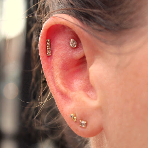 Explore saint michael tattoo ideas, creative tattoo ideas in Brooklyn, available at Ahimsa Piercing Studio & BVLA Fine Jewelry