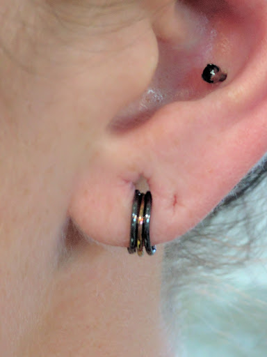 Explore lion chest tattoo ideas, creative tattoo ideas in Nashville, available at Dahlia Fine Jewelry & Body Piercing