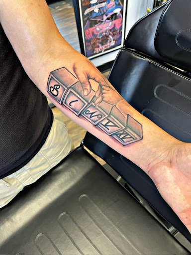 Explore underdog tattoo ideas, creative tattoo ideas in Alexandria, available at WreckLezz iNK Tattoo Studio