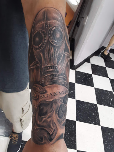 Explore skull sleeve tattoo ideas, creative tattoo ideas in Loveland, available at Moon Light Tattoos