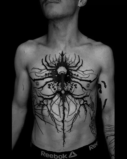 Explore tree tattoo ideas for guys, creative tattoo ideas in Kent, available at Defiance Tattoos