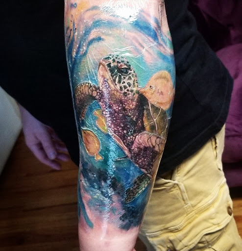 Explore tattoo ideas for men on hand, creative tattoo ideas in Asheboro, available at Wonderland Tattoo