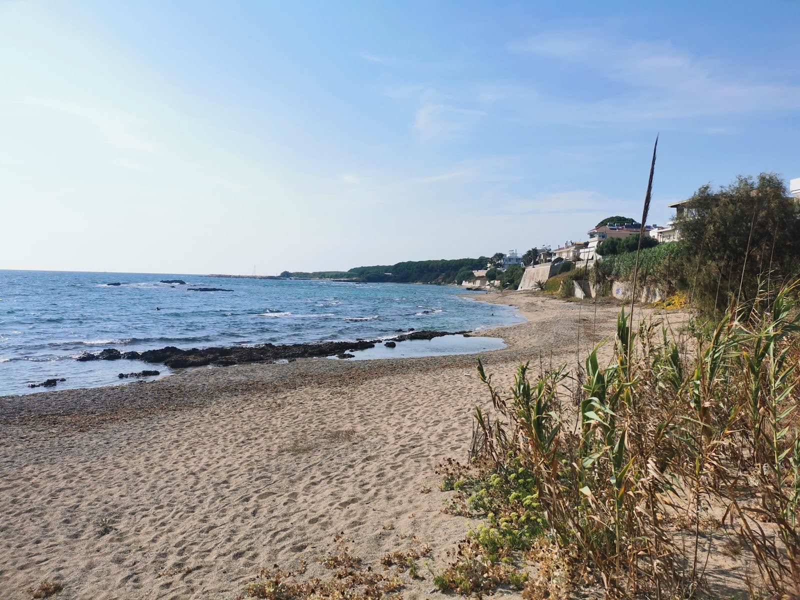 Foto von Pantokrator Beach mit beiger sand & steine Oberfläche