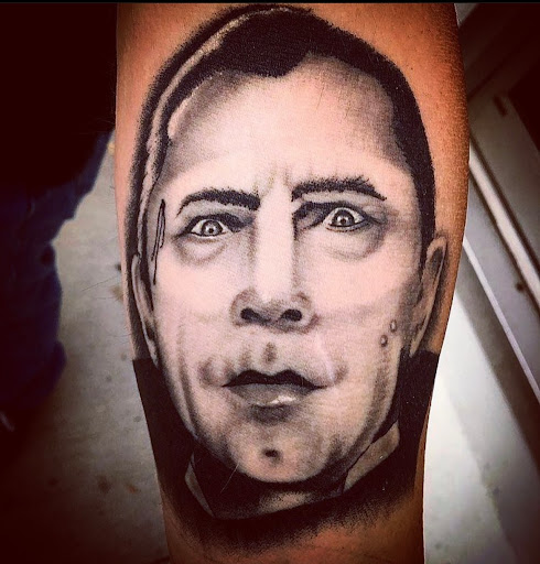 Explore godsmack tattoo ideas, creative tattoo ideas in Cincinnati, available at Reapers and Roses Tattoo Studio