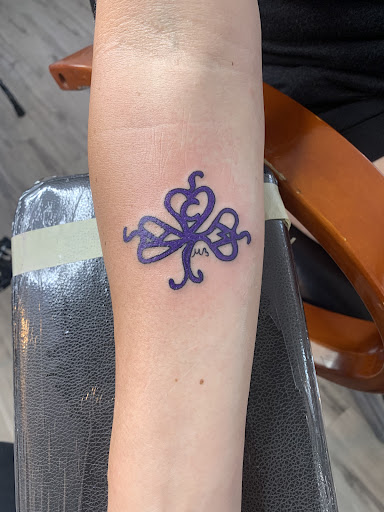 Explore tattoo cover up ideas for females, creative tattoo ideas in Dayton, available at Aisle 9 Tattoo