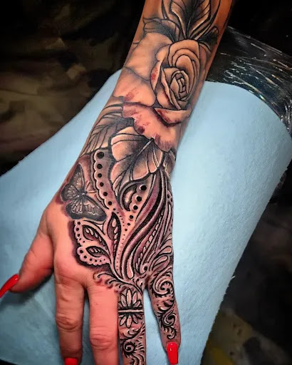 Explore sun tattoo ideas for guys, creative tattoo ideas in Colton, available at Vengeance Ink Tattoo & body piercing