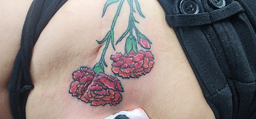 Explore tattoo ideas for black people, creative tattoo ideas in Riverside, available at Darkstar Tattoo CA