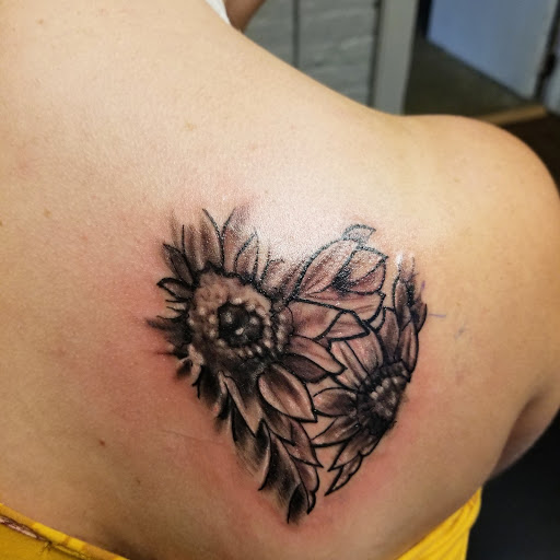 Explore traditional tattoo filler ideas, creative tattoo ideas in Cumberland, available at Queen City Ink