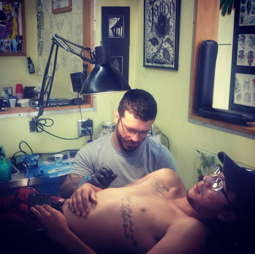 Explore tattoo ideas for dead dog, creative tattoo ideas in Miami Beach, available at Tattoos by Lou Miami - South Beach