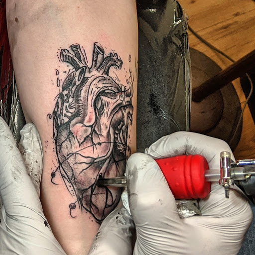 Explore mom tattoo ideas for son, creative tattoo ideas in Harrisburg, available at Rayzor Tattoos