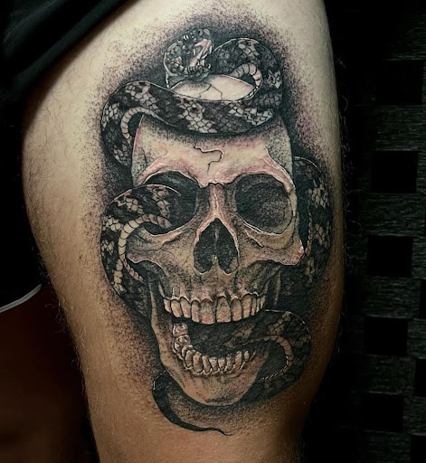 Explore hood tattoo ideas, creative tattoo ideas in Dallas, available at Change of Tides Tattoo