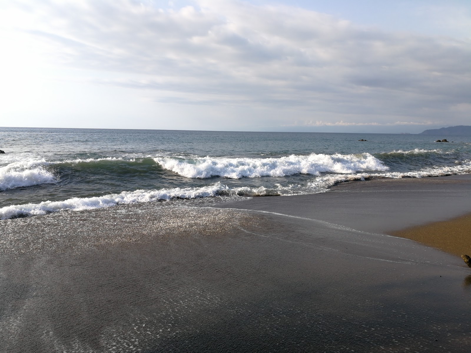 Foto di Cocalito Beach con una superficie del acqua turchese