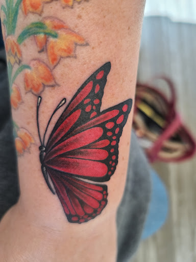 Explore pinterest flower tattoo ideas, creative tattoo ideas in Toledo, available at Artistik Tat2 and Body Piercing