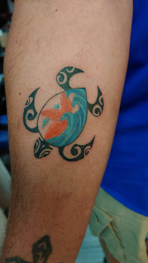 Explore color flower tattoo ideas, creative tattoo ideas in Jonesboro, available at Immortal Ink