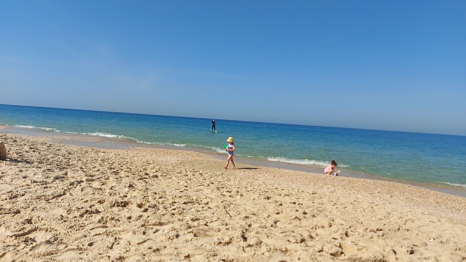 Fotografija Zikim beach z svetel pesek površino