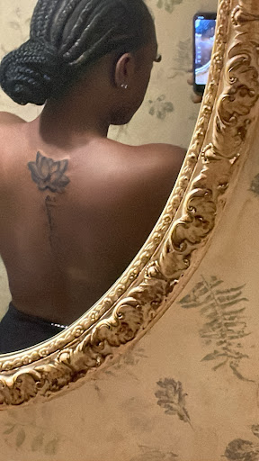 Explore color flower tattoo ideas, creative tattoo ideas in Little Rock, available at Arkansas School of Tattoos and Piercings