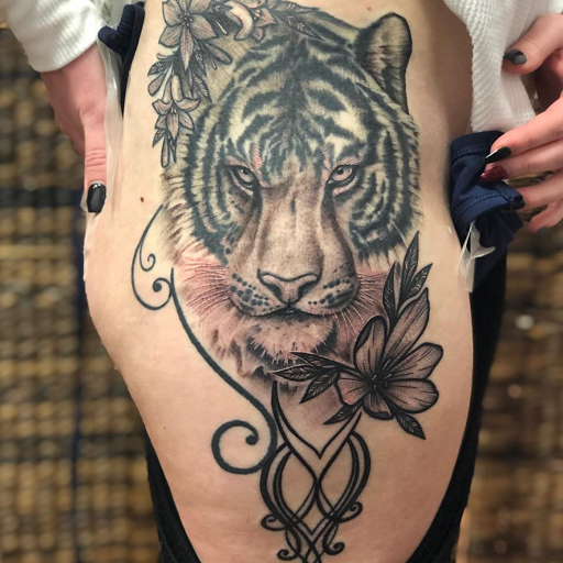 Explore mens face tattoos ideas, creative tattoo ideas in Aledo, available at Elevated Tattoo & Piercing