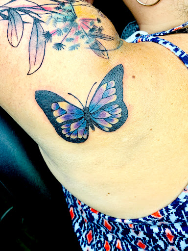 Explore tattoo ideas men, creative tattoo ideas in Lake City, available at Crooked Spines Tattoo Studio