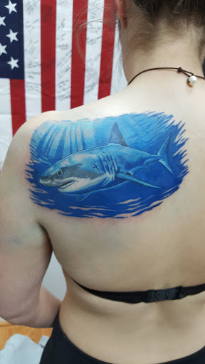 Explore indian feather tattoo ideas, creative tattoo ideas in Pelham, available at Skin Worx Inc
