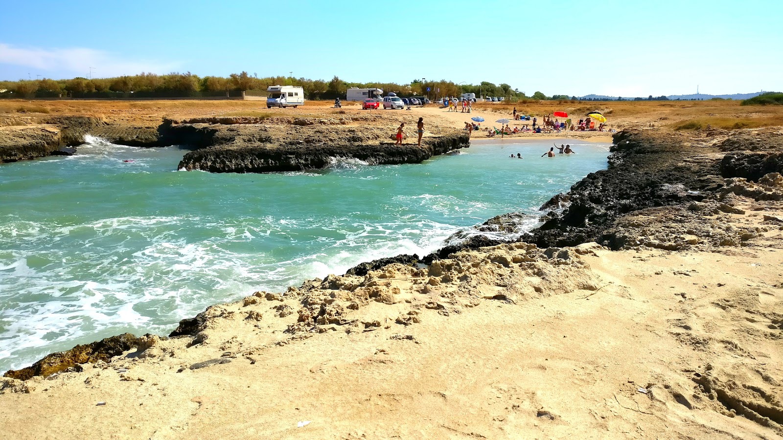 Photo of Costa Merlata beach with small multi bays