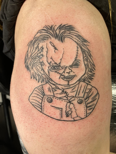 Explore fist bump tattoo ideas, creative tattoo ideas in Warner Robins, available at Untold Pain Tattoo Studio