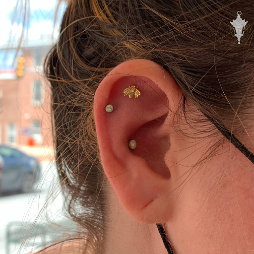 Explore tattoo ideas for behind the ear, creative tattoo ideas in West Chester, available at Safe Harbor Body Adornment