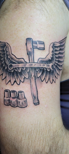 Explore rectangle tattoo ideas, creative tattoo ideas in Angola, available at Hoodlum Ink