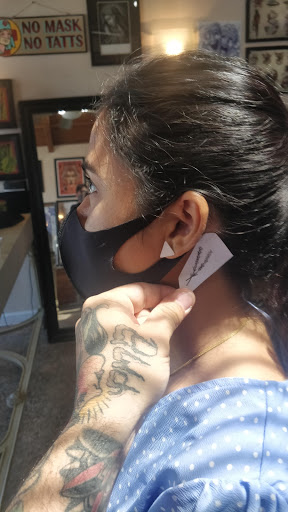 Explore guitar pick tattoo ideas, creative tattoo ideas in San Jose, available at Blue Rose Tattoo