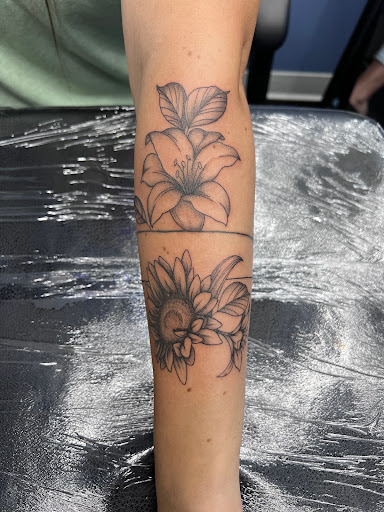 Explore wrist tattoo name ideas, creative tattoo ideas in Erie, available at Code of Honor Tattoo