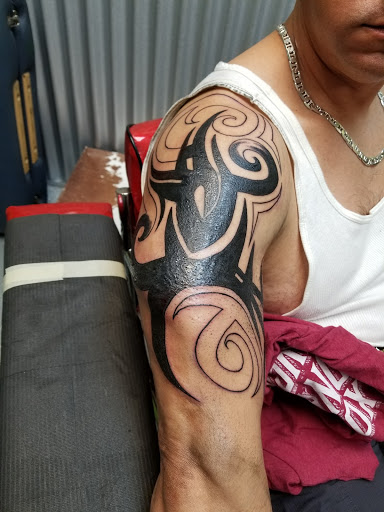 Explore gemini tattoo ideas for guys, creative tattoo ideas in League City, available at Zen Body Art & Adornment Tattoo Shop