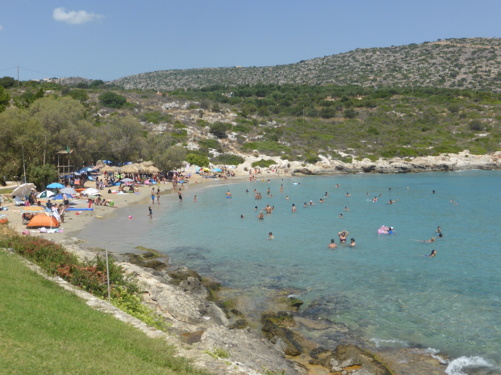 Photo of Loutraki Beach with turquoise pure water surface