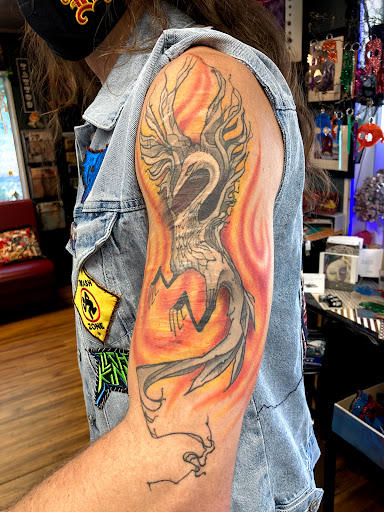 Explore black hole tattoo ideas, creative tattoo ideas in Eugene, available at Whiteaker Tattoo Collective