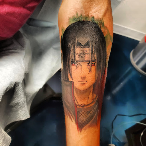 Find planet tattoo ideas for your next unique tattoo in Buford at Inked Arts Tattoo Studio