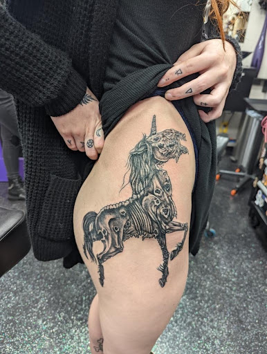 Explore black and white sleeve tattoo ideas, creative tattoo ideas in Slippery Rock, available at Dinky Dachshund Tattoo Parlor