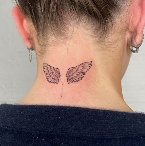 Explore singing tattoo ideas, creative tattoo ideas in New York, available at L.O.V.E.machine Street Tattoo Shop