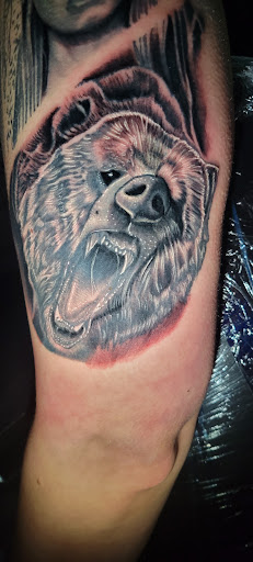 Explore avocado tattoo ideas, creative tattoo ideas in Angola, available at Hoodlum Ink