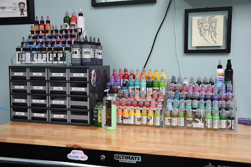 Explore wolf sleeve tattoo ideas, creative tattoo ideas in Decatur, available at Thistle & Fern Tattoo Company