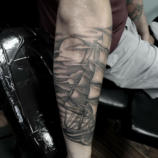 Explore small tattoo ideas for lower back, creative tattoo ideas in Calhoun, available at A Sailors Grave Tattoo Parlor