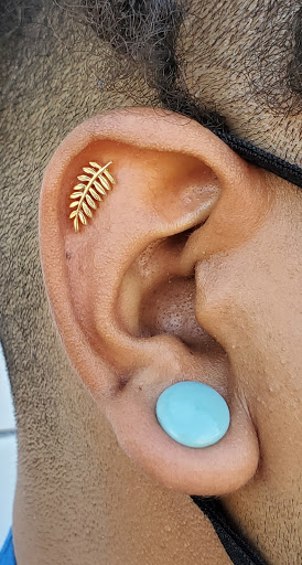 Explore film tattoo ideas, creative tattoo ideas in Phoenix, available at Wholehearted Body Piercing