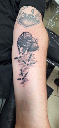 Explore ride or die tattoo ideas, creative tattoo ideas in Sarasota, available at SEVEN SINS Tattoo Studio