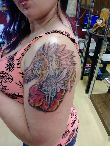 Explore queen of hearts tattoo ideas, creative tattoo ideas in Sedalia, available at Skin Thieves Tattoo Studio