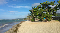 Foto van Playa Barigua met recht en lang