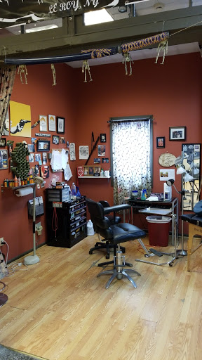 Explore chest tattoo filler ideas, creative tattoo ideas in Le Roy, available at Blood Money Ink